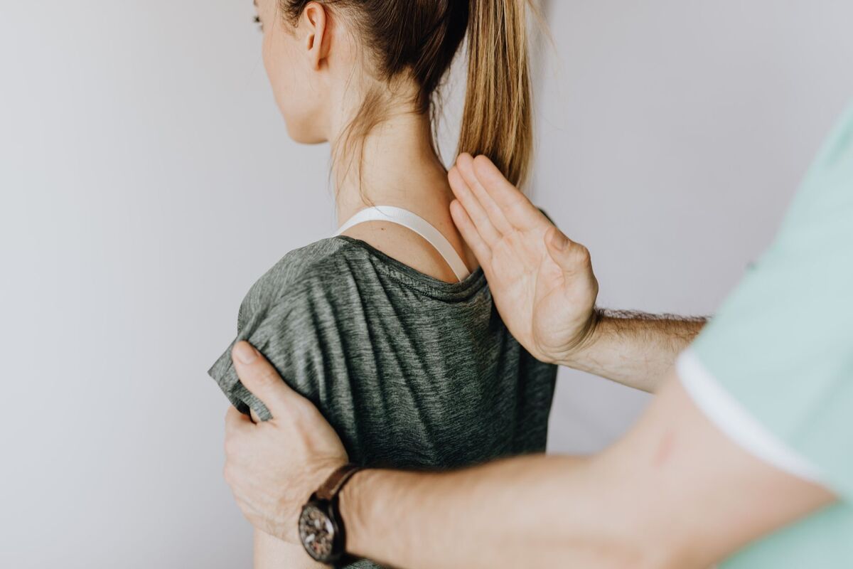 Chiropractor adjusting a patient in a Nashville clinic