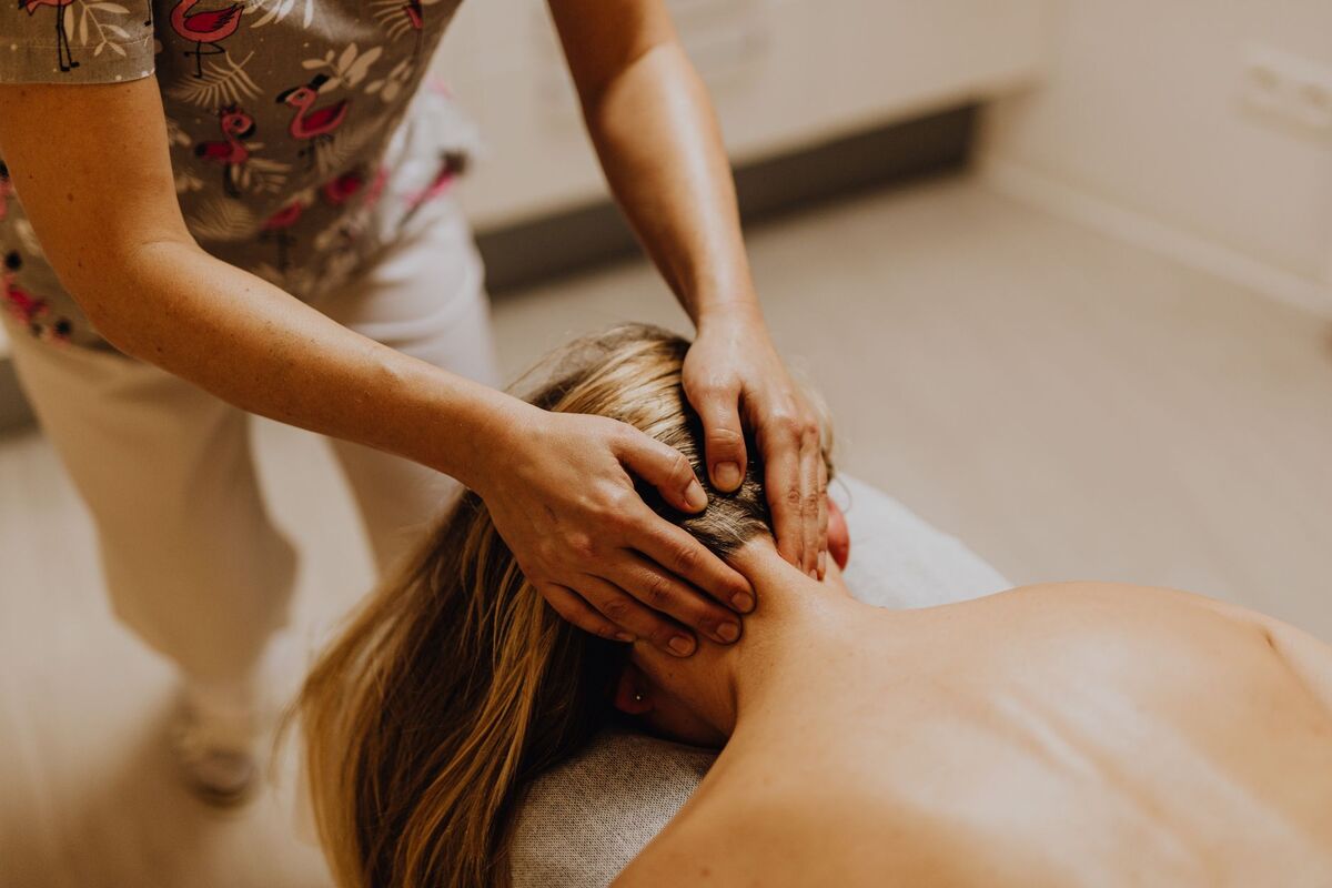 Chiropractor performing a cervical treatment