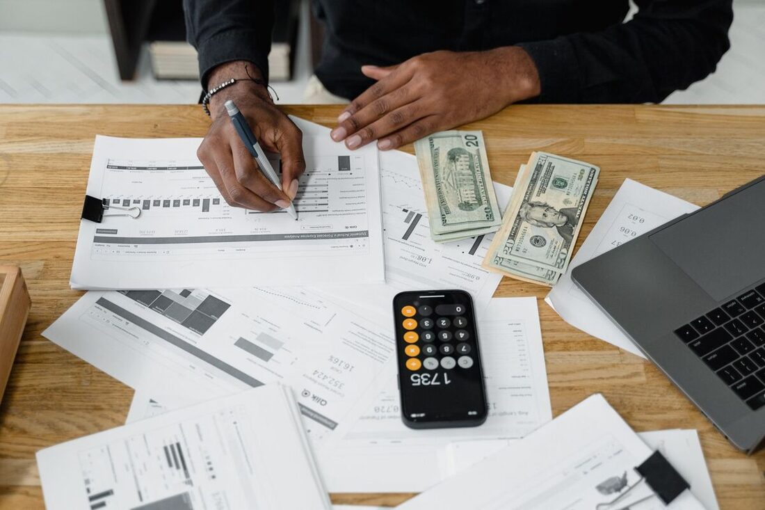 Accountant analyzing financial reports for a specific industry