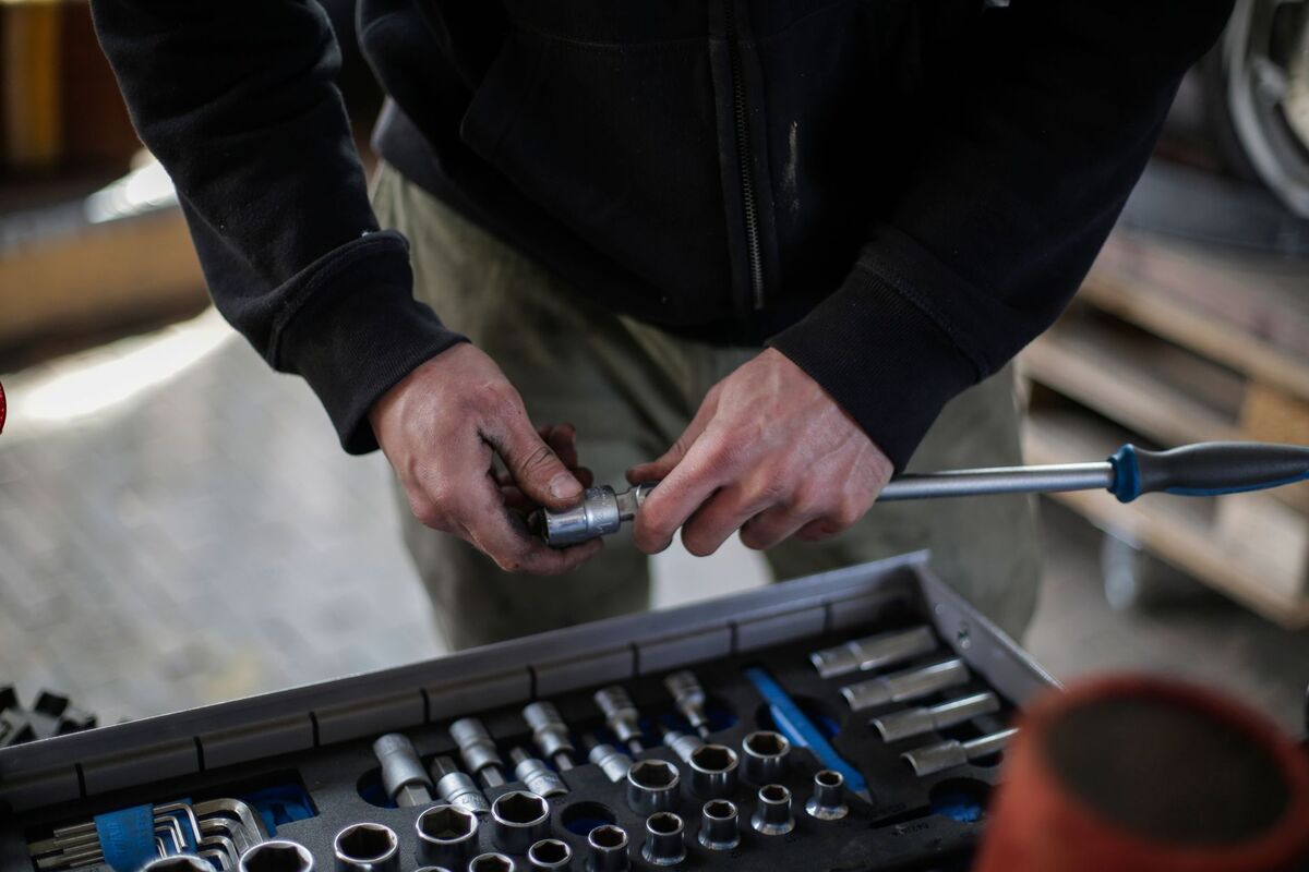 HVAC technician's tools during an AC repair