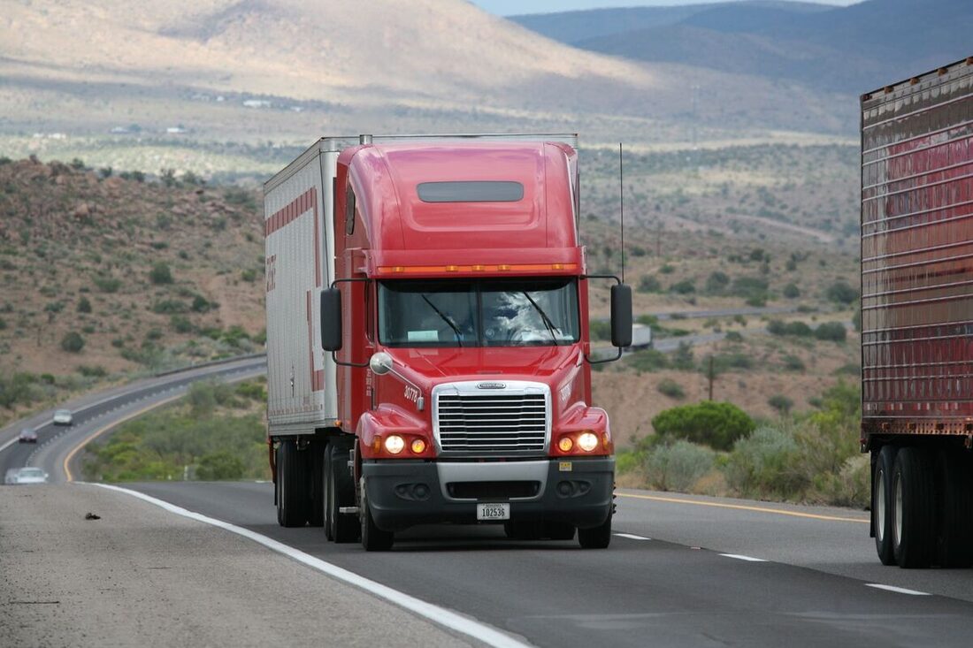 Freight truck hauling cargo on a highway