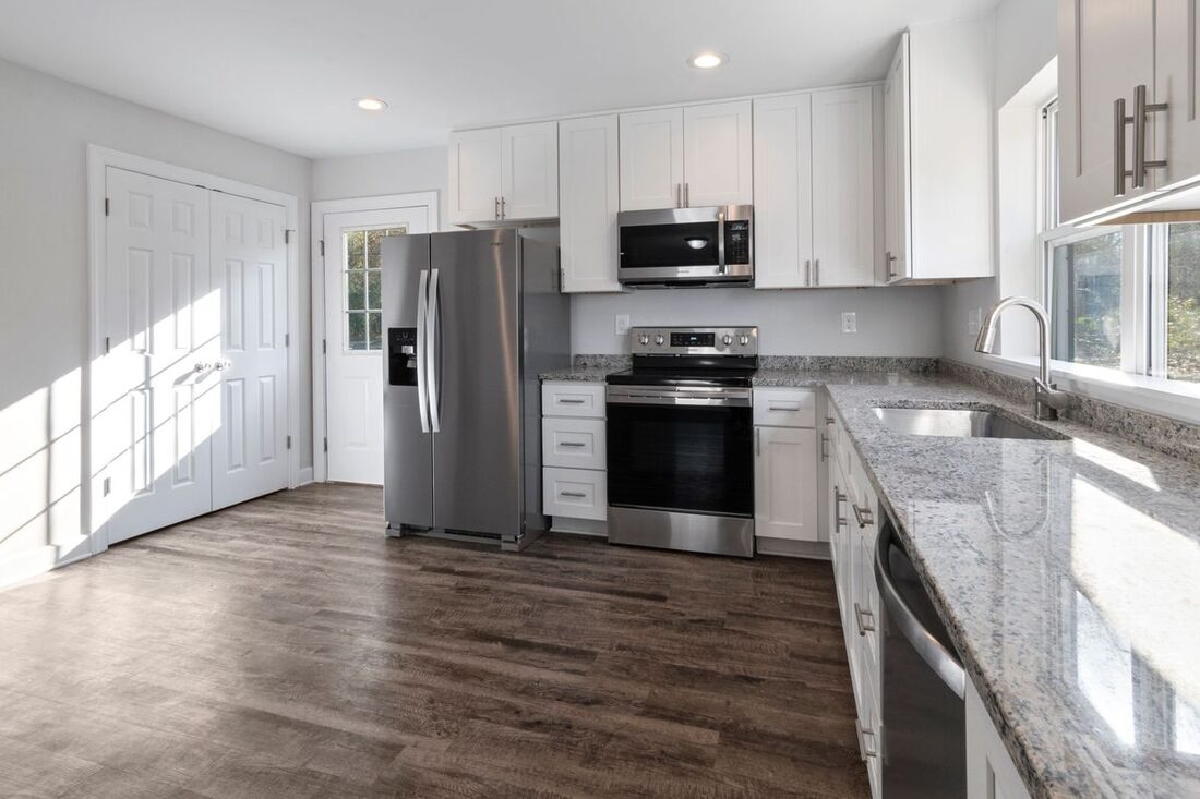 Finished modern kitchen renovation with stainless appliances