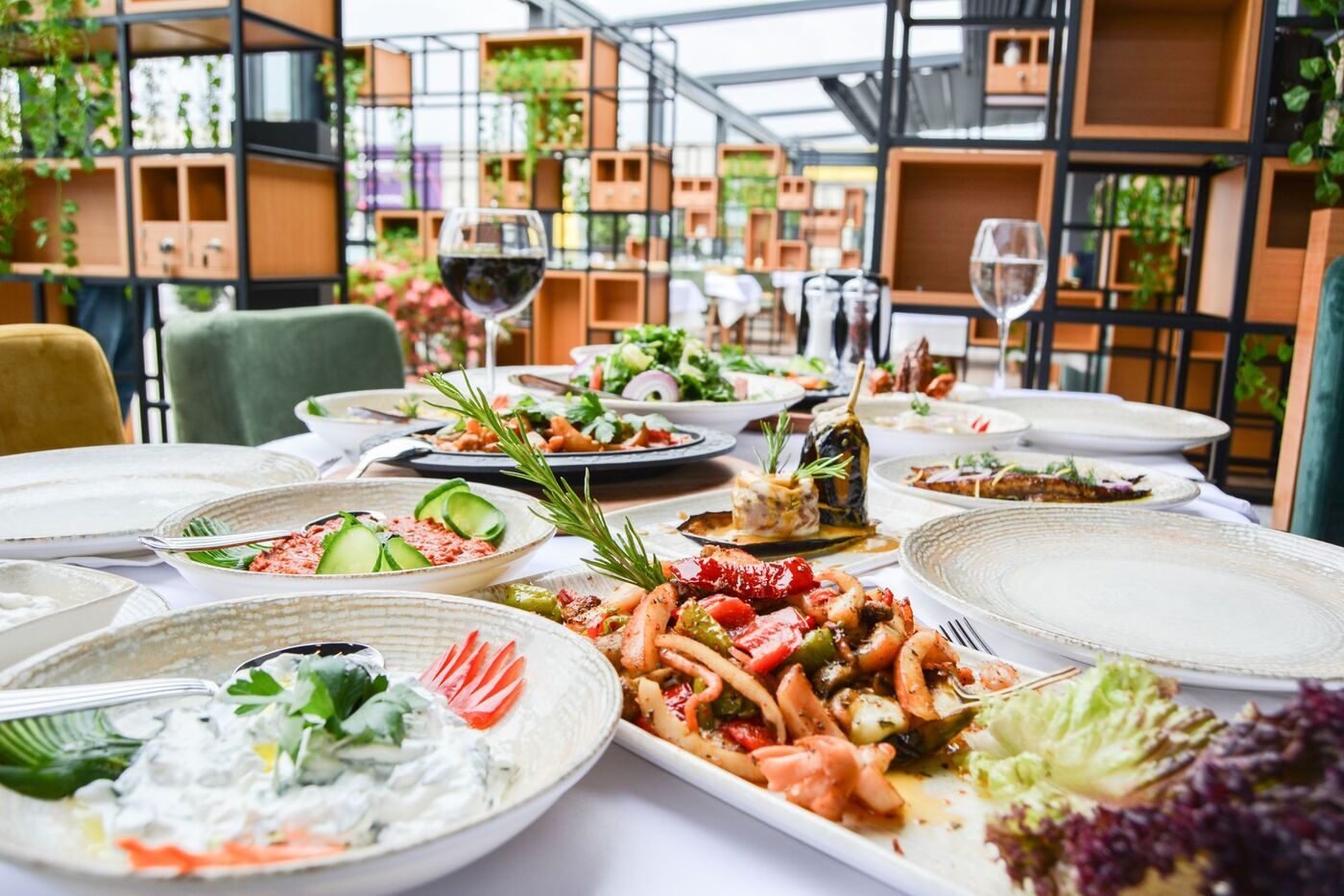 A lavish spread of plated gourmet dishes on a Nashville restaurant table